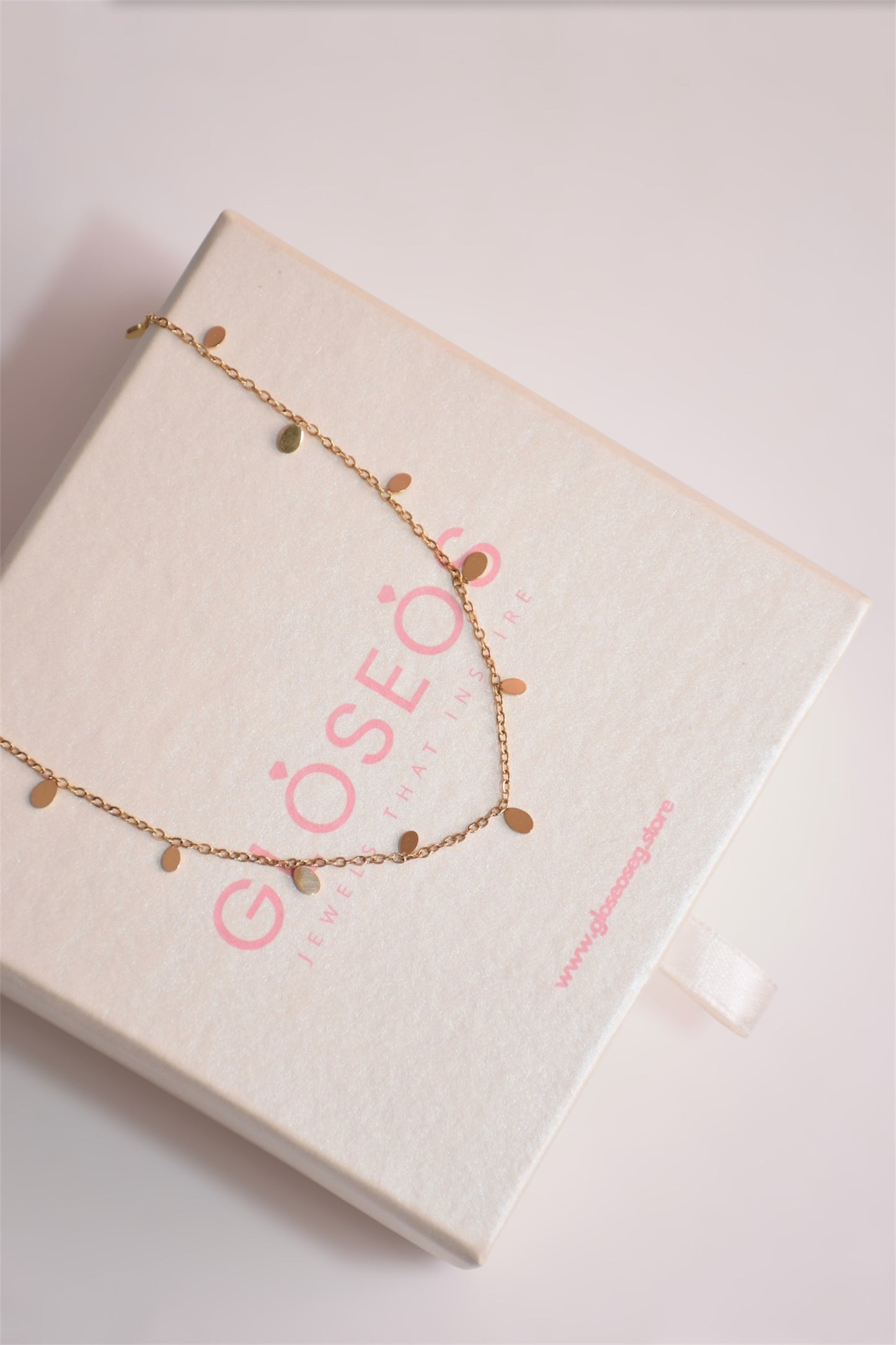 Golden raindrop necklace