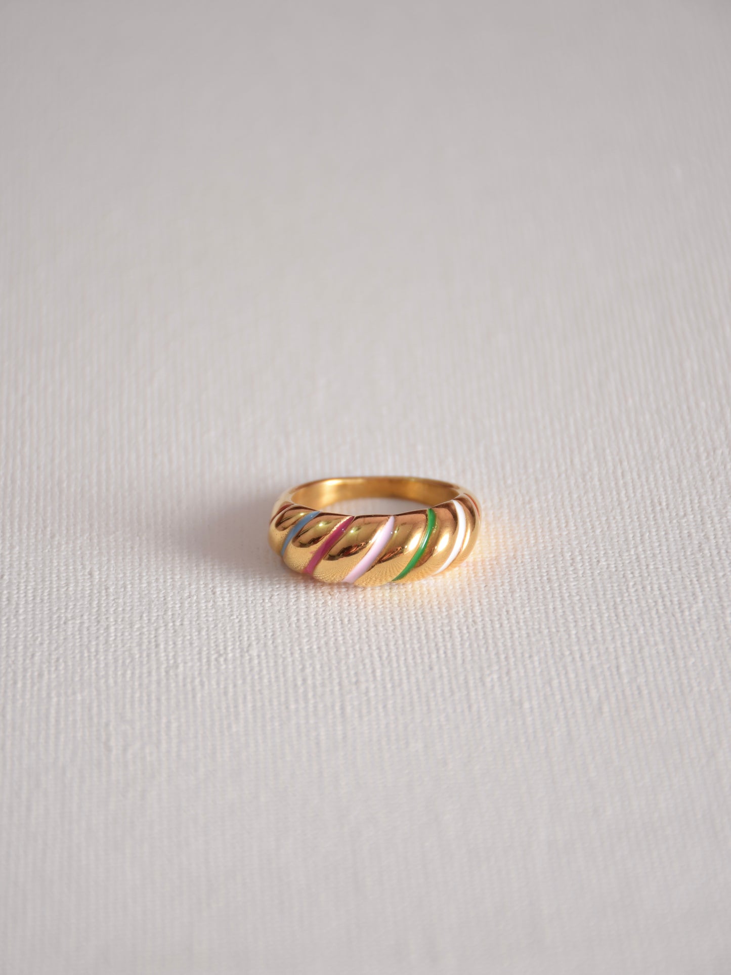Colourful twisted croissant ring