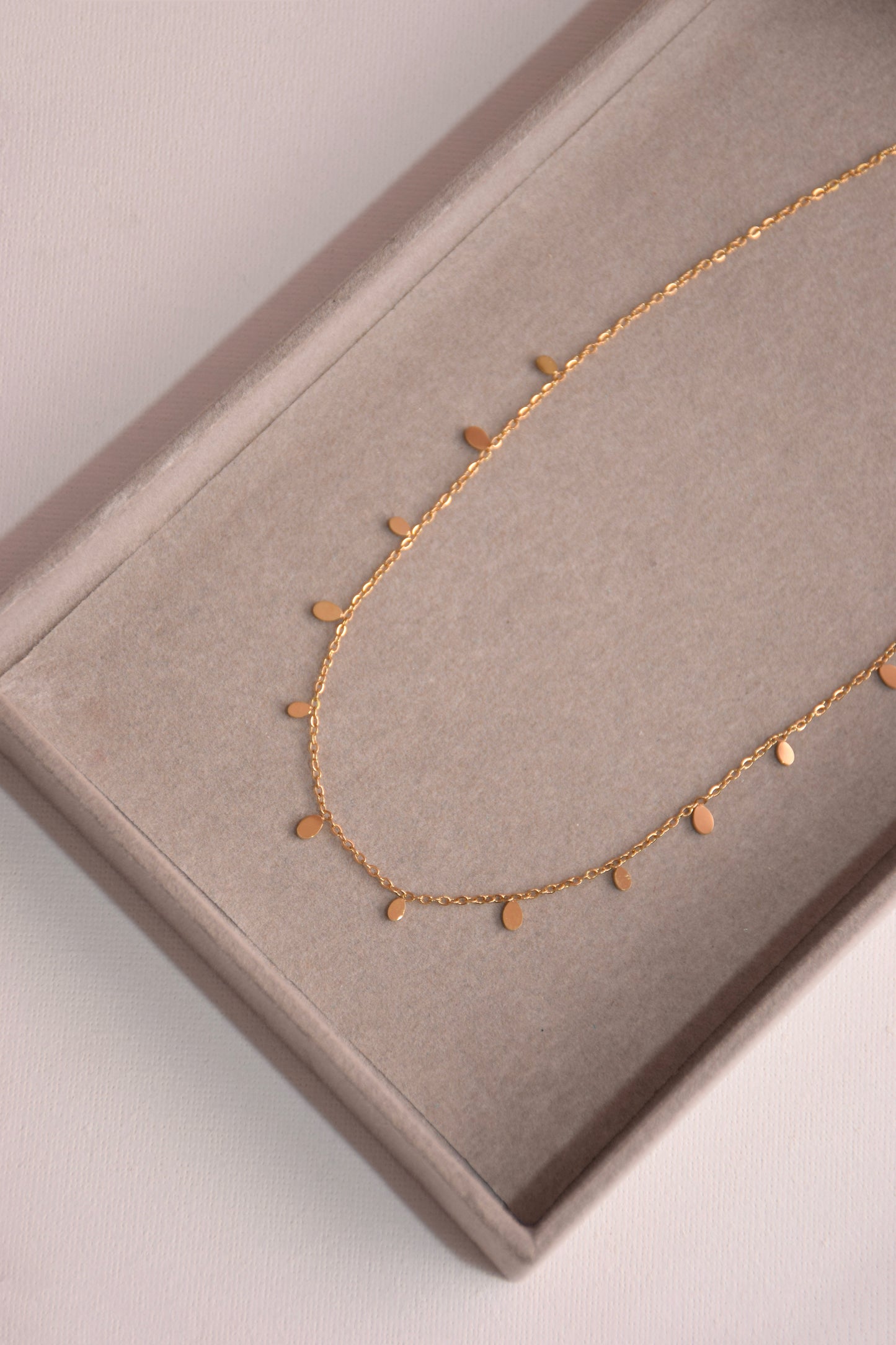 Golden raindrop necklace