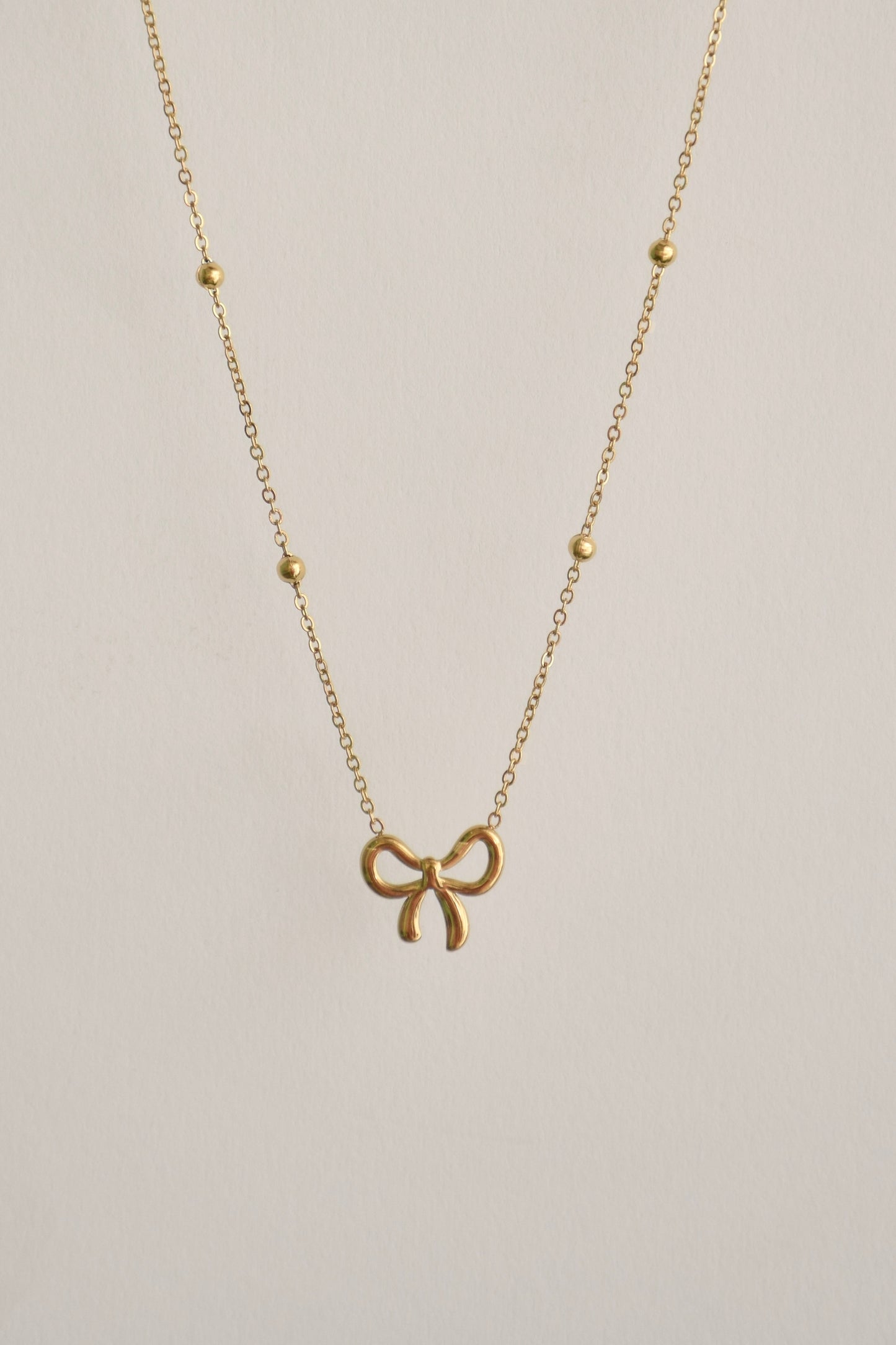 Bow pendant necklace